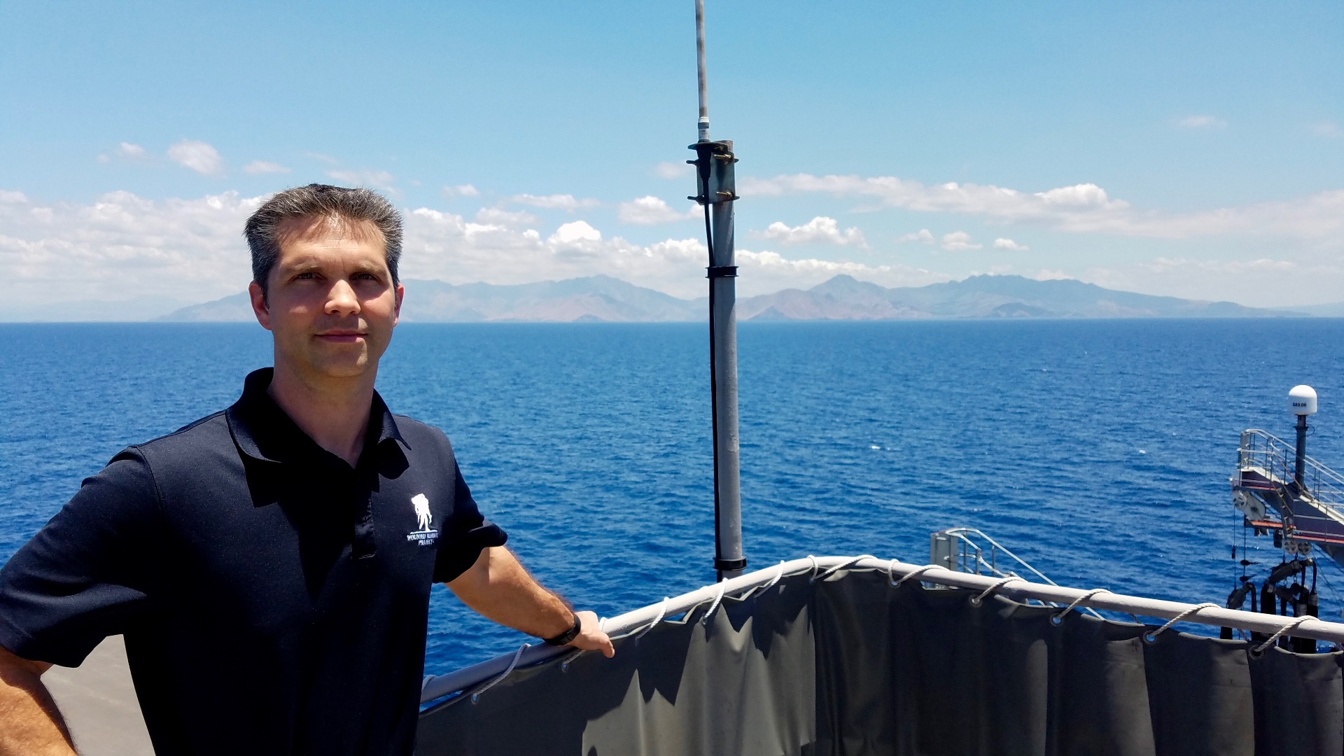 Loukas Wilson on a ship deck at sea